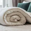 Couette chaude : matières, garnissages et critères pour ne pas se tromper